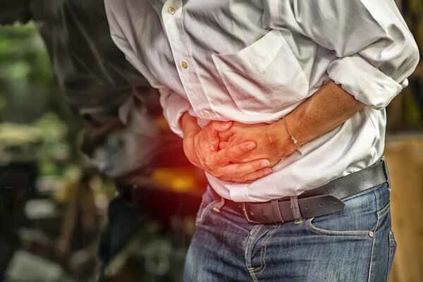 Could the abdominal pain be a sign of mild intestinal obstruction?