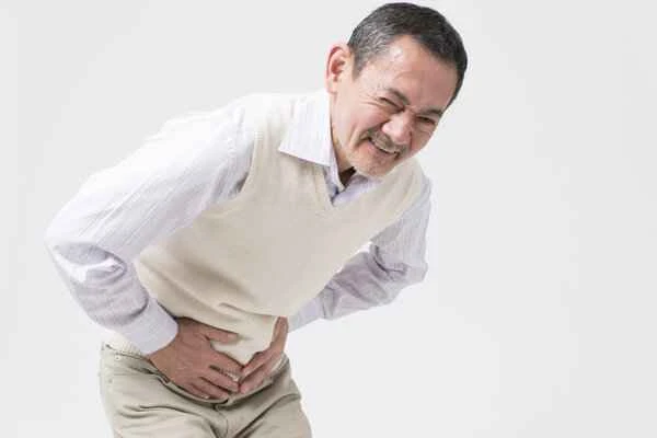 Can intravenous infusion for intestinal obstruction cause abdominal pain?